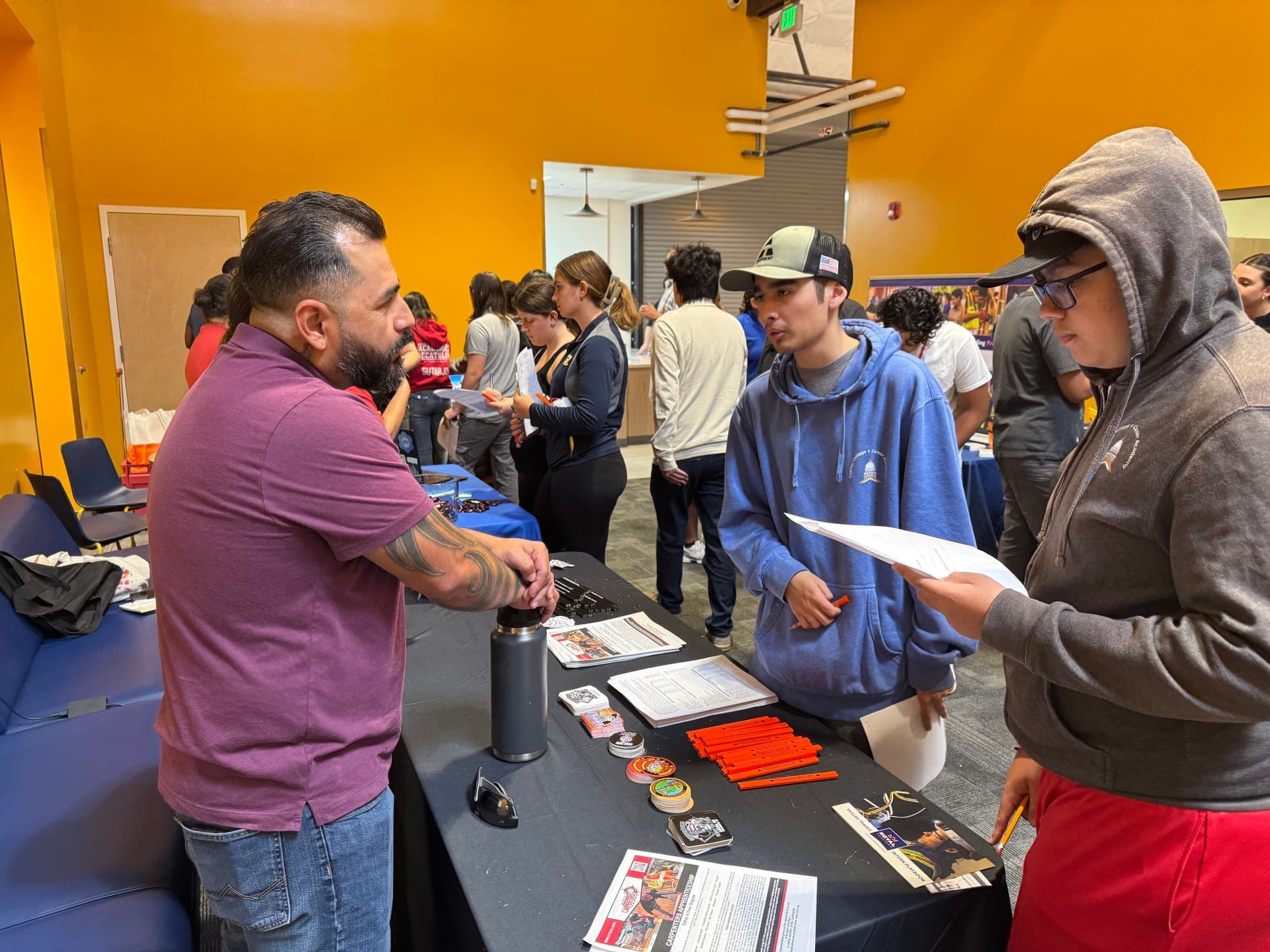 A CCCA Works! industry partner meeting students at a career fair